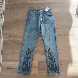 Size xs denim jeans with black flame detail